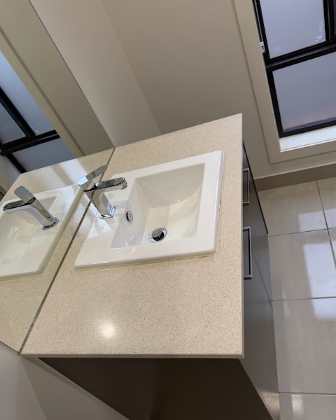 What Does A Bond Cleaner Actually Clean In A Rental Property? 1 spotless bathroom sink and vanity cleaned during an end of lease bond clean in toowoomba